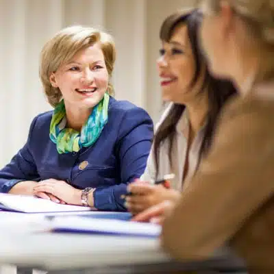 Women smiling during bible study