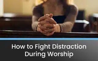 A woman sitting in a church listening to a worship service.