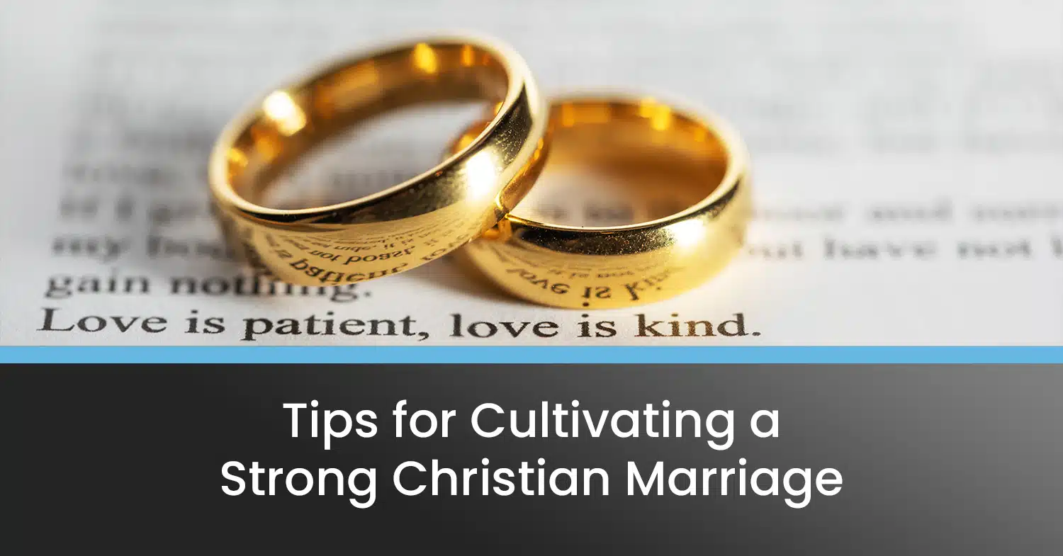 Weddings rings from a Christian marriage, sitting on an open Bible.